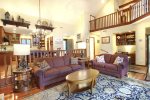 A view of the loft, dining and kitchen from the living room.